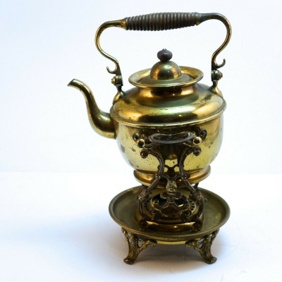 brass antique tipping kettle